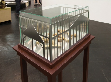 Human capital market, 2010|Object/Model, Stainless steel cut |seven stamps, glasscase |30 x 42 x 28,5 cm |Table/pedestal, wood,|35 x 47 x 91,44 cm |Editions of 3